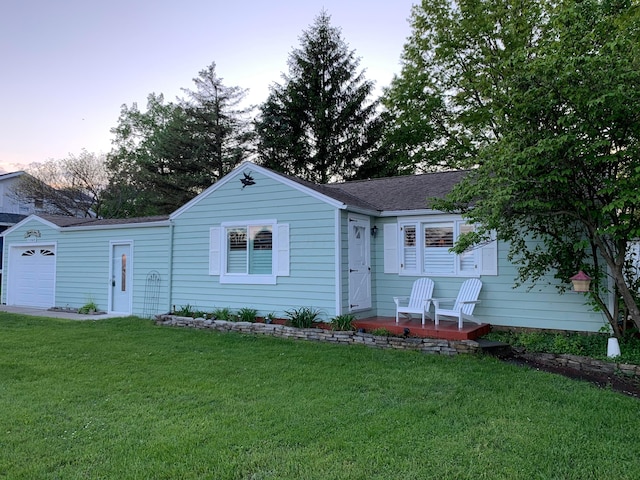 view of front of home with a lawn