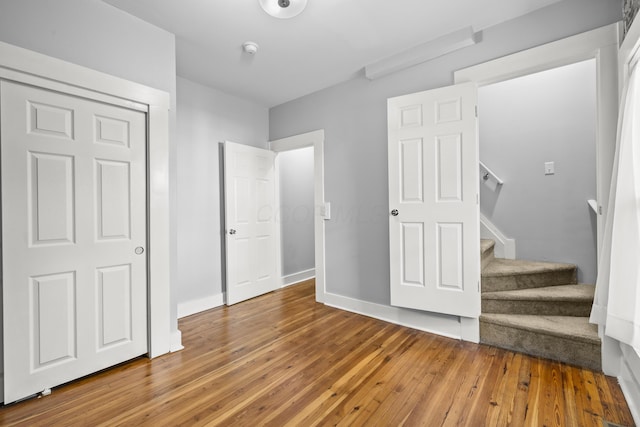 bedroom featuring hardwood / wood-style floors