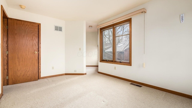 spare room with carpet flooring