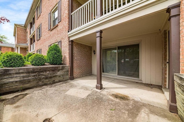 view of patio / terrace with a balcony