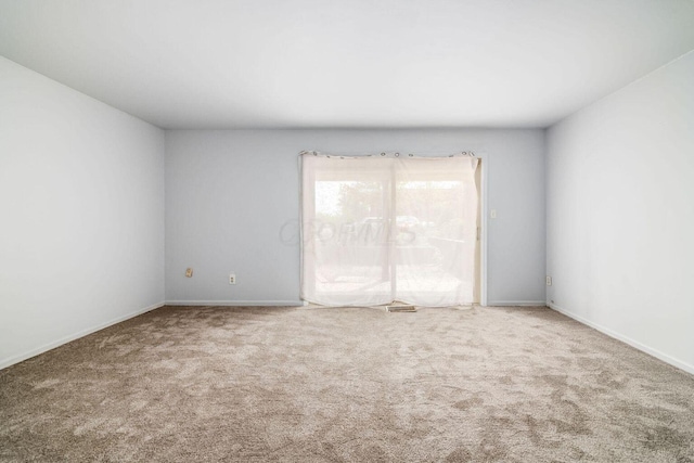 empty room with carpet floors