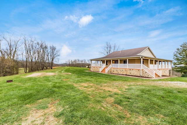 view of yard featuring a porch