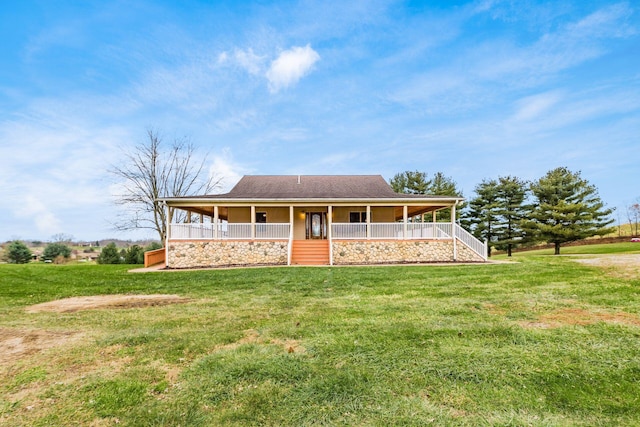 farmhouse-style home featuring a front yard and covered porch