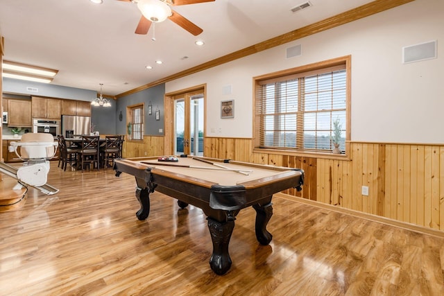 playroom featuring wooden walls, billiards, ornamental molding, ceiling fan, and light wood-type flooring