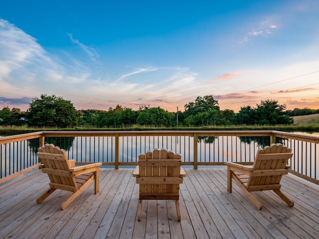 deck at dusk with a water view