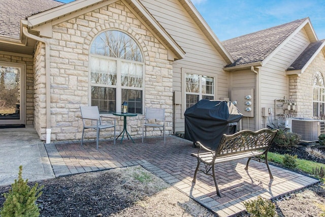 view of patio featuring grilling area and central AC unit