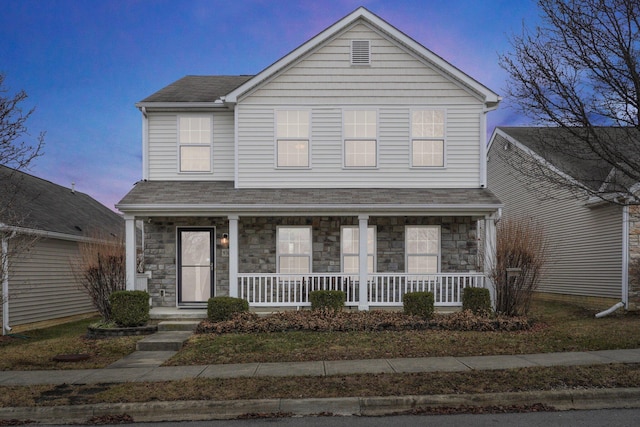 front facade with a porch