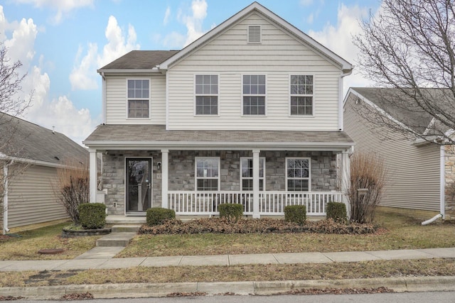 front of property featuring a porch