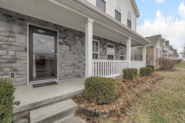 property entrance with a porch