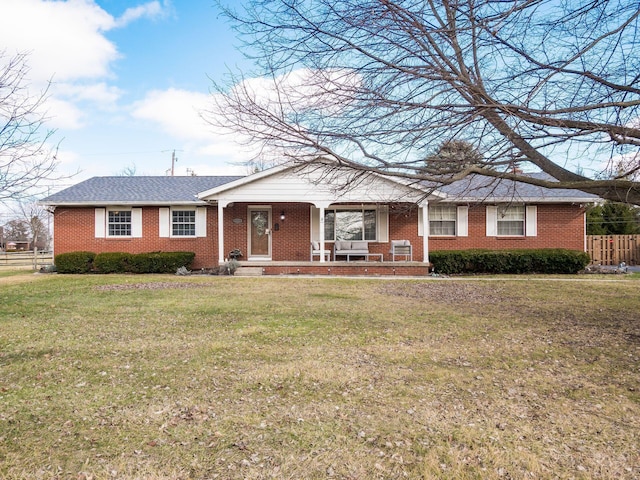 single story home with a front yard