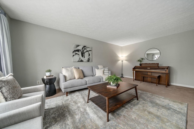 living room featuring a textured ceiling and carpet flooring