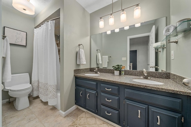 full bathroom featuring vanity, shower / tub combo, tile patterned floors, and toilet