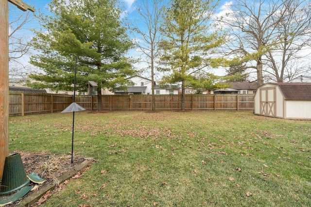 view of yard with a storage shed