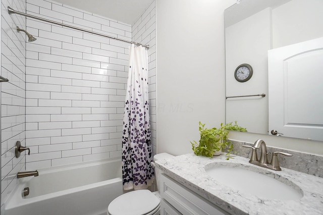 full bathroom featuring vanity, toilet, and shower / bath combo