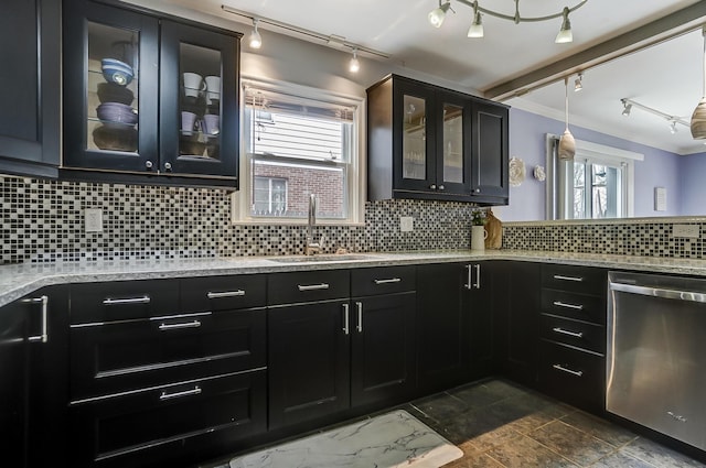 kitchen featuring sink, dishwasher, light stone countertops, decorative backsplash, and decorative light fixtures