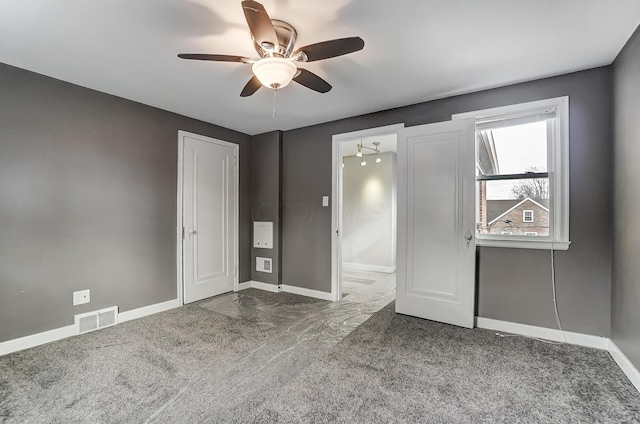 unfurnished bedroom with carpet and ceiling fan