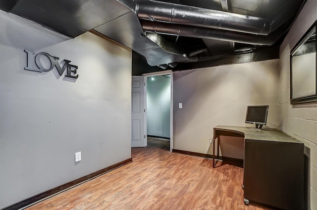 basement with light wood-type flooring