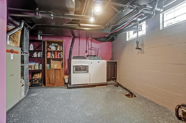 basement featuring washing machine and dryer