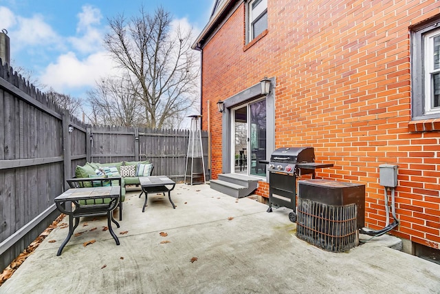 view of patio / terrace featuring a grill and outdoor lounge area