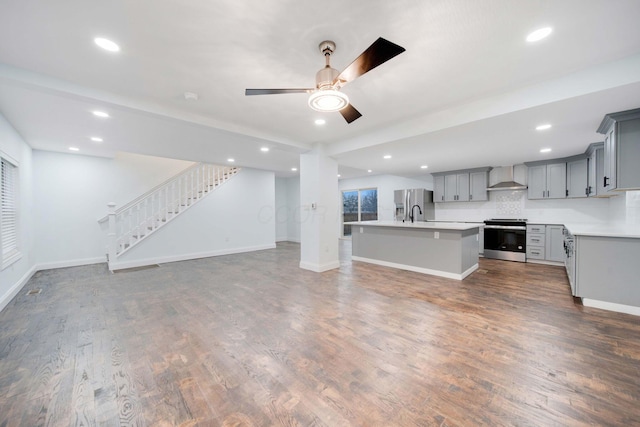 4874 Ridge St, Columbus, OH 43207 - unfurnished living room with dark hardwood / wood-style floors and ceiling fan