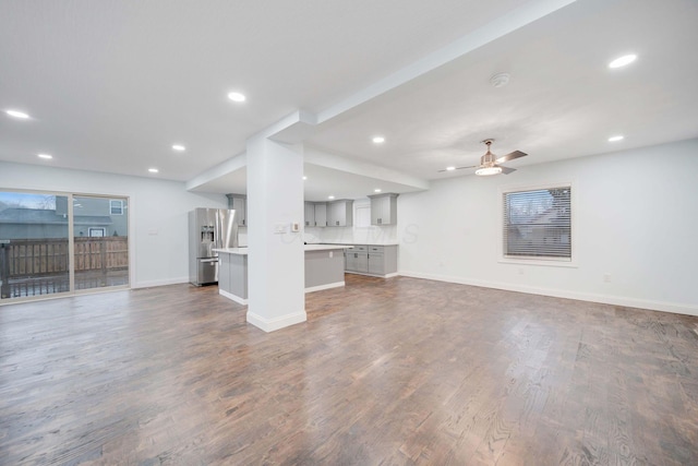 4874 Ridge St, Columbus, OH 43207 - unfurnished living room with dark wood-type flooring and ceiling fan