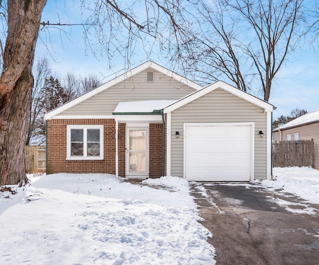 view of front of property with a garage