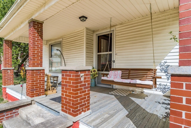 wooden deck with a porch