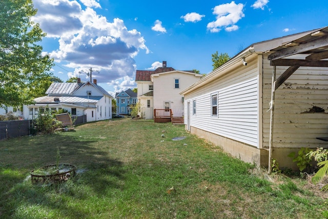 view of yard featuring an outdoor fire pit