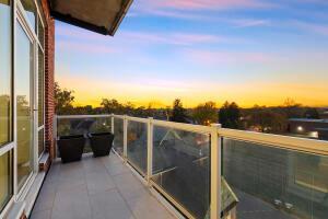 view of balcony at dusk