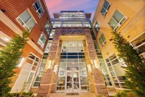 view of outdoor building at dusk