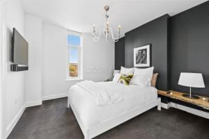 bedroom with an inviting chandelier