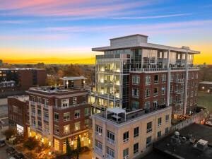 view of outdoor building at dusk