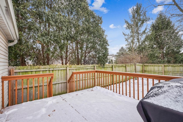 view of snow covered deck