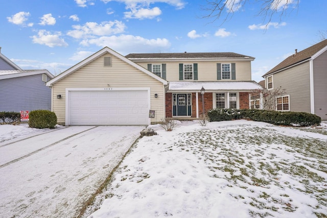 front of property with a garage