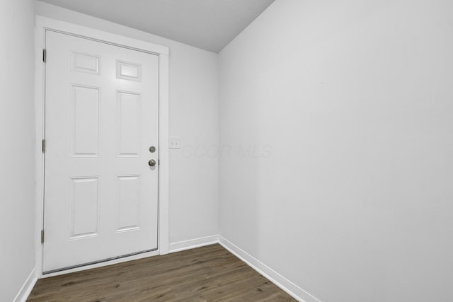 doorway featuring dark hardwood / wood-style flooring