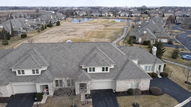 drone / aerial view with a residential view