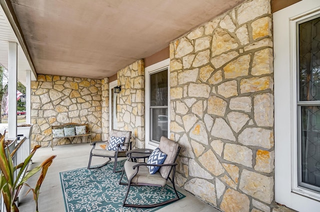 balcony featuring a porch