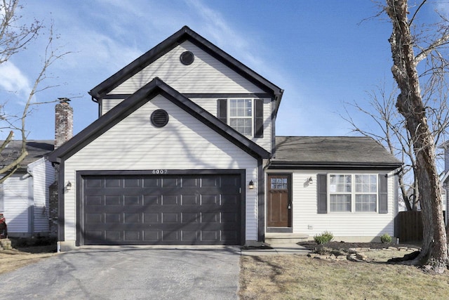 front of property featuring a garage