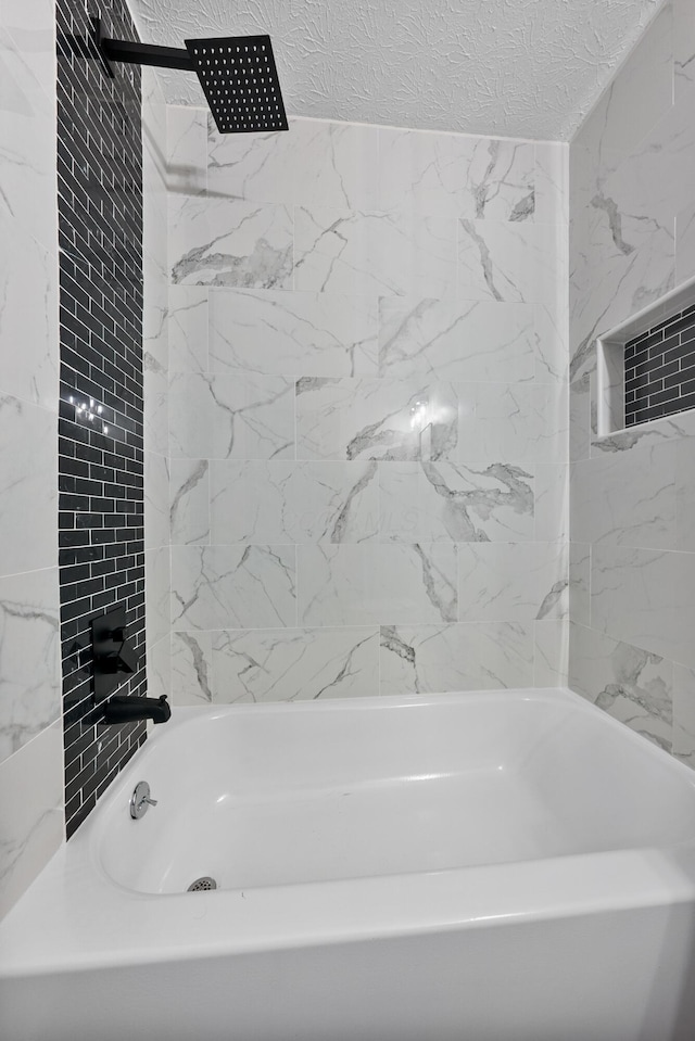 bathroom featuring a textured ceiling