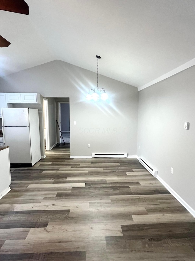 unfurnished dining area with baseboard heating, lofted ceiling, an inviting chandelier, and dark wood-type flooring