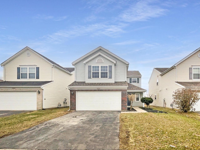 front of property featuring a garage and a front yard