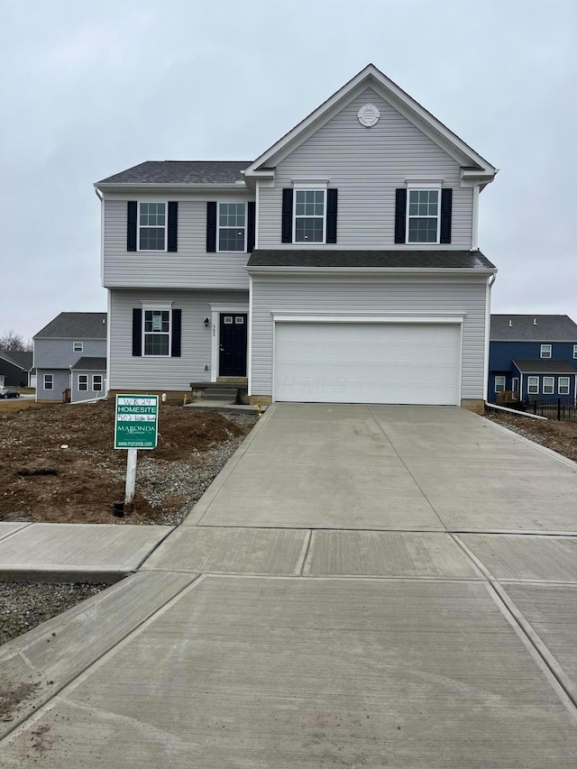 front of property featuring a garage