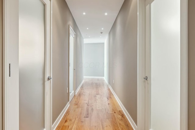 hallway featuring light hardwood / wood-style floors