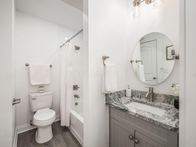 full bathroom featuring vanity, toilet, shower / tub combo, and wood-type flooring