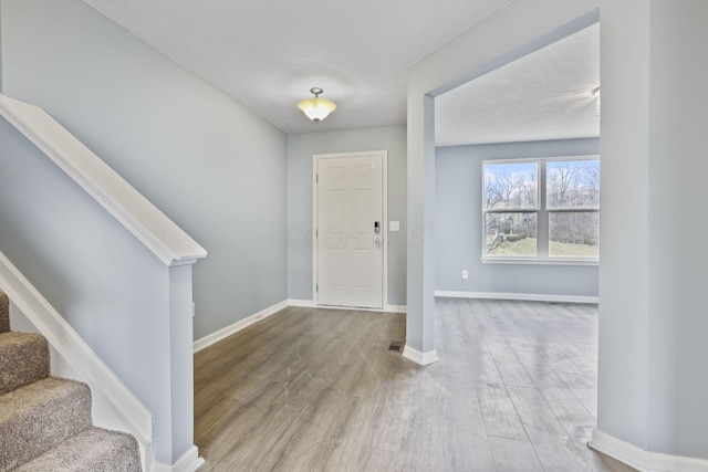 entryway featuring hardwood / wood-style flooring