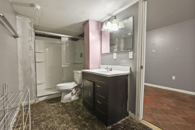 bathroom with a shower, vanity, and toilet