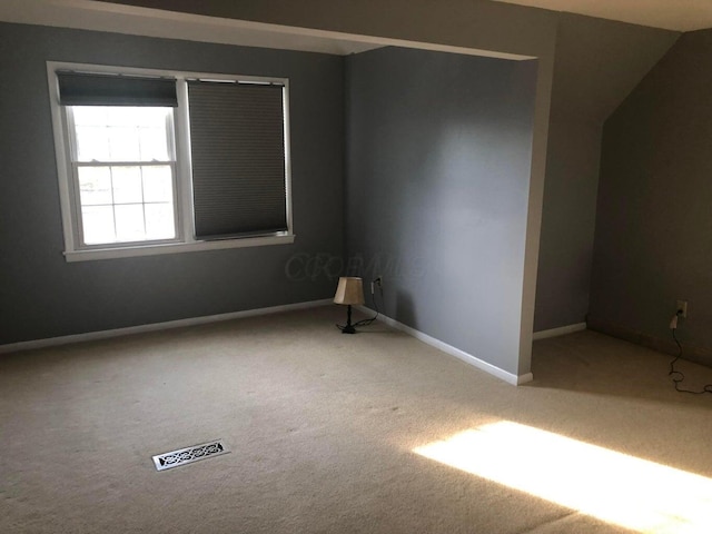 unfurnished room featuring carpet floors