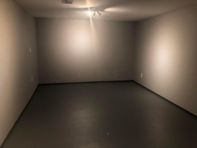 empty room featuring concrete floors