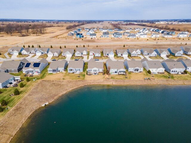 aerial view with a residential view and a water view