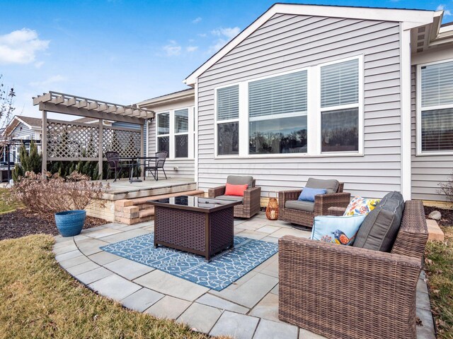 view of patio / terrace with an outdoor hangout area and a pergola